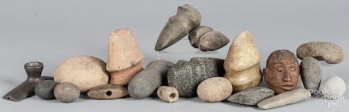 Group of Native American stone axe heads and imple