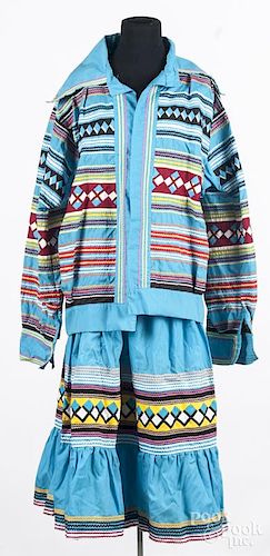 Seminole Native American men's and women's pieced traditional costume, to include a man's jacket, and a woman's jacket and sk