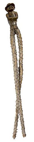 337. Cowboy Cactus Folk-Art Cane – Ca. Mid-20th Century – Carved cowboy and hat with crossed arms and a handmade metal be