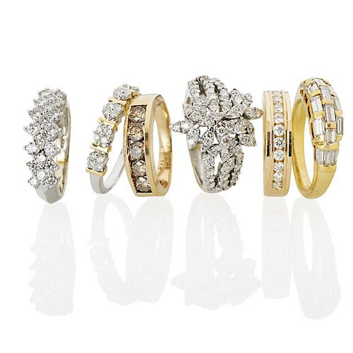 SIX DIAMOND RINGS IN WHITE OR YELLOW GOLD