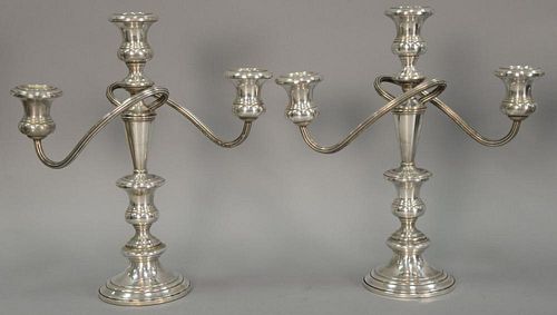Pair of Fisher sterling silver candelabras with weighted base. ht. 12in.