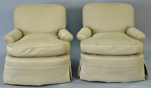 Pair of custom tan upholstered club chairs with down filled cushions. very clean condition.