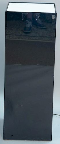 Black plexiglass pedestal with illuminated top. ht. 39in., top: 19" x 19"