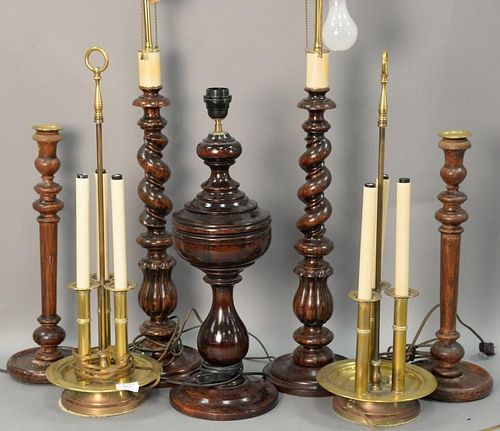 Seven table lamps to include five wood turned lamps along with a pair of brass triple candlestick lamps. ht. 18 1/2in. to 33i