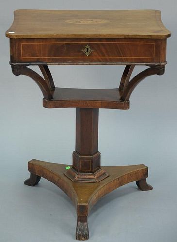 Regency style mahogany sewing stand having lift top with inlaid conch shell, opening to fitted interior, line inlaid on pedes
