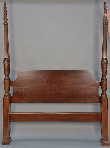 Queen size mahogany four post bed with carved and fluted post. ht. 87in.