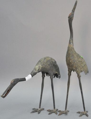 Pair of bronze cranes. ht. 13in. & 24 1/2in.