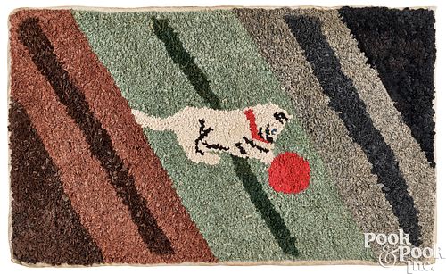 Hooked rug of a cat with a ball, early 20th c.