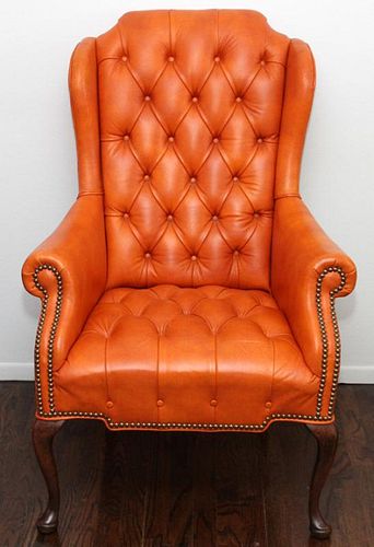 ORANGE QUEEN ANN STYLE TUFTED LEATHER ARM CHAIR