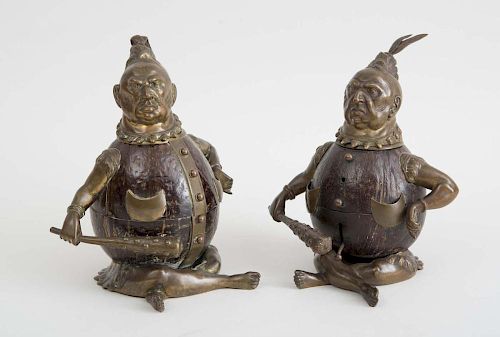 PAIR OF AMUSING BRASS-MOUNTED COCONUT INKWELLS, EACH IN THE FORM OF NATIVE AMERICAN WARRIORS