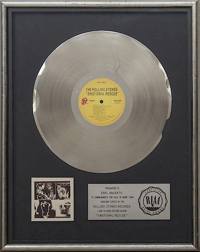 ROLLING STONES PLATINUM RECORD AWARD, RIAA AWARD PRESENTED TO EARL MCGRATH FOR THE ROLLING STONES ALBUM EMOTIONAL RESCUE
21 1