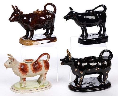 ASSORTED CERAMIC FIGURAL COW CREAMERS, LOT OF FOUR