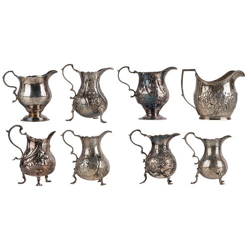 A Collection of Georgian Sterling Cream Pitchers