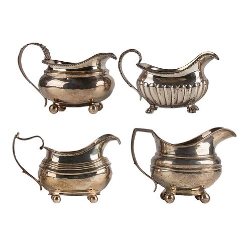 A Collection of Georgian Sterling Cream Pitchers.