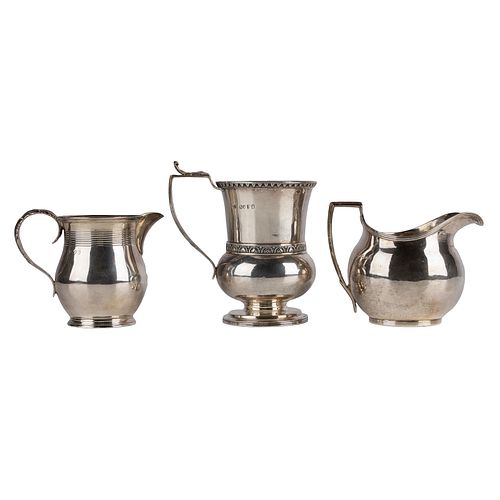 A Collection of Georgian Sterling Cream Pitchers