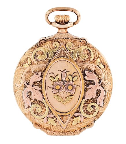 An early 20th century Longines pocket watch with very decorative three color gold case
