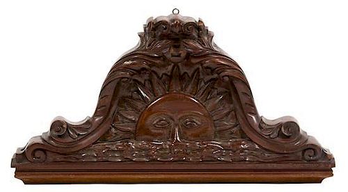 A Continental Carved Mahogany Wall Mount Height 13 1/2 x width 26 inches.