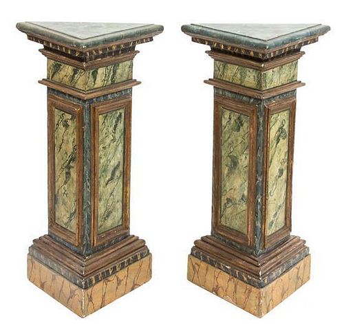 A Pair of Italian Faux Marble Painted Triangular Pedestals Height 30 1/2 x width 15 x depth 15 inches.