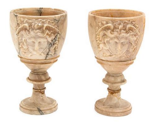 A Pair of Carved Alabaster Goblets Height 9 inches.