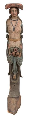 An Italian Carved and Polychromed Wood Corbel Figure Height 49 inches.