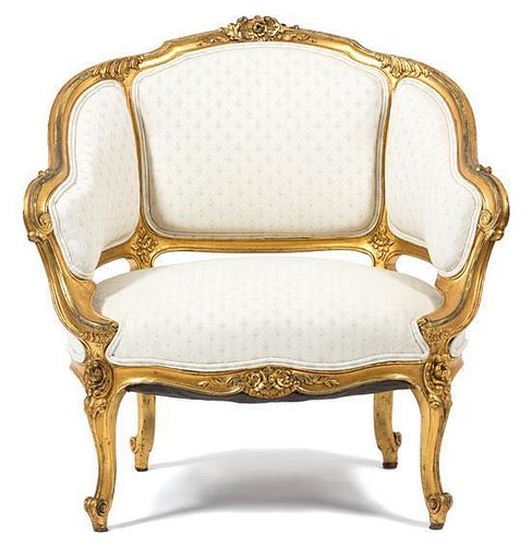 A Louis XV Style Giltwood Bergere Height 32 3/4 x width 32 x depth 22 inches.
