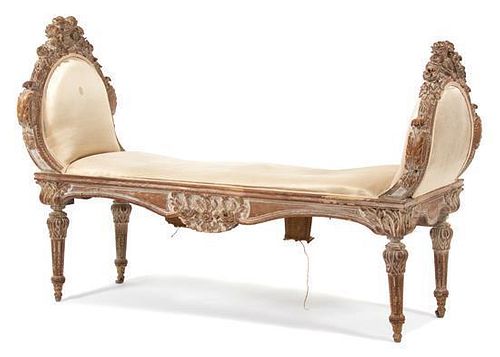 A Louis XVI Style Carved and Upholstered Window Seat Height 33 x width 49 1/2 x depth 19 inches.
