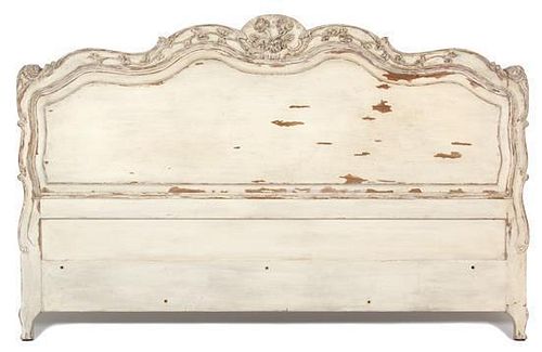 A Louis XVI Style Carved and Painted Wood King Size Headboard Height 51 inches.
