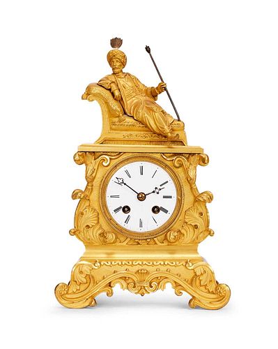 RAINGO FRERES, PARIS: AN 1830'S FRENCH ORIENTALIST GILT BRONZE CLOCK DEPICTING A SULTAN