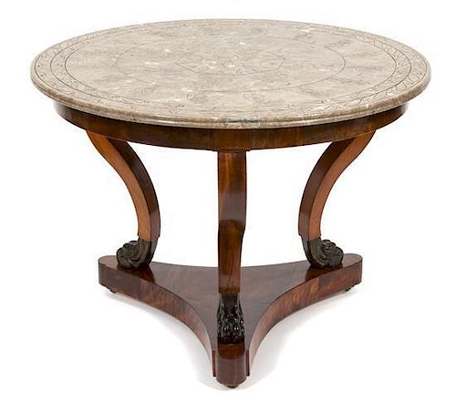 A Louis Philippe Style Center Table Height 28 x diameter 39 inches.