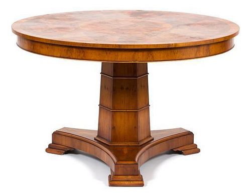 A Louis Phillipe Style Pedestal Table Height 30 x diameter 48 inches.