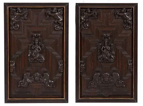 A Pair of English Carved Oak Panels Height 30 3/4 x width 19 1/2 inches.