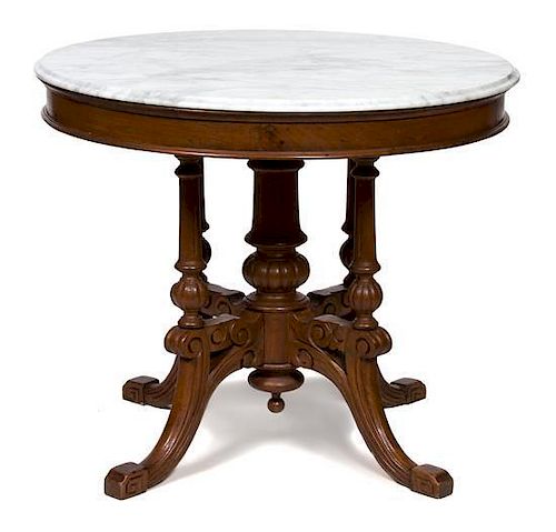 An English Regency Style Marble Top Table Height 30 x diameter 36 inches.