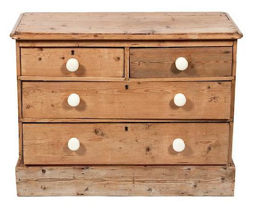 An English Pine Chest of Drawers Height 29 x width 37 1/2 x depth 17 inches.