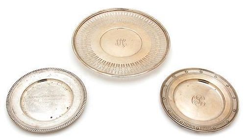 Three American Silver Plates, Unknown Maker, one having a reticulated border and reeded edge, together with two smaller plate