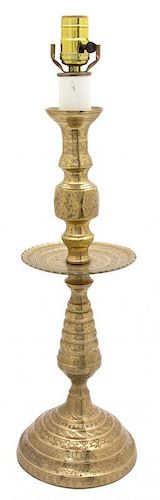 An Indian Embossed Brass Table Lamp Height 23 inches.
