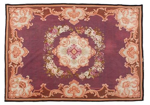 An Aubusson Tapestry Rug 7 feet 4 inches x 5 feet 4 inches.