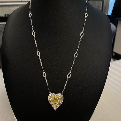 GIA Certified 5.03 carat Fancy Intense Yellow Heart Shape Diamond Pendant