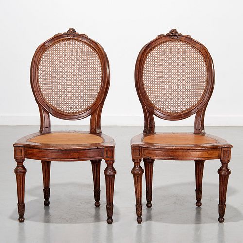 Pair Continental Neoclassic walnut chairs, 18th c.
