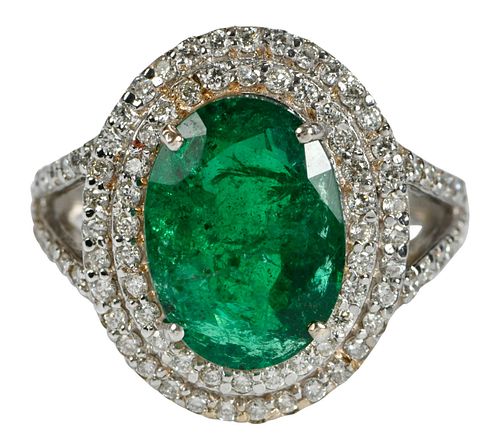 18kt. Emerald and Double Halo Diamond Ring