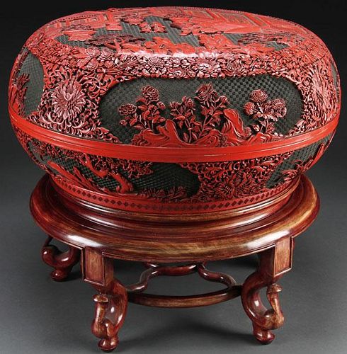A LARGE CHINESE CARVED RED LACQUER CINNABAR BOX