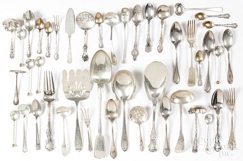 Sterling silver flatware and serving utensils, 47