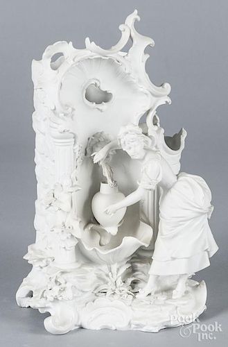 Bisque spill vase, late 19th c., woman at lavabo