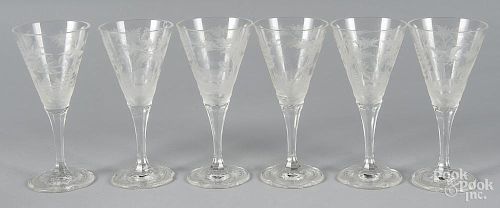 Twelve engraved wine glasses