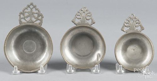 Three New England pewter porringer tasters, 19th c., largest - 3 5/8'' dia.