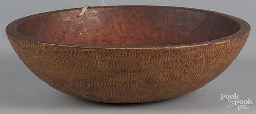 Turned maple bowl with later ochre swirl decoration, 4'' h., 13 3/4'' dia.