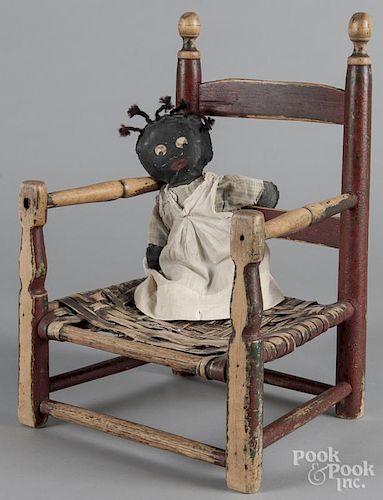 Painted childs chair, together with a black Americana doll, 19'' h.