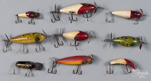 Six South Bend wood Surf Oreno fishing lures, together with a Lil Rascal, Dive Oreno and a Tease-ore