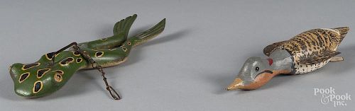 Carved and painted swimming duck fish decoy, 20th c., 10'' l., together with a frog, signed K. Bower