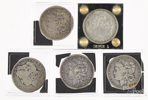 Five Morgan silver dollars, to include 1881 O, 1882 S, 1885 S, 1887, and 1891 O.