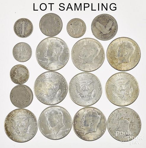 Fourteen 90% silver half dollars, mostly Kennedys, together with four silver quarters, twenty silver